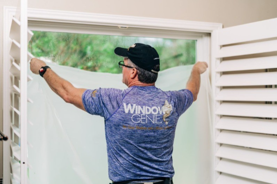 Window Genie tech performing residential window tinting 