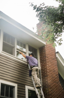 Window Genie tech doing residential window cleaning.