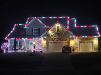 home decorated in holiday lights