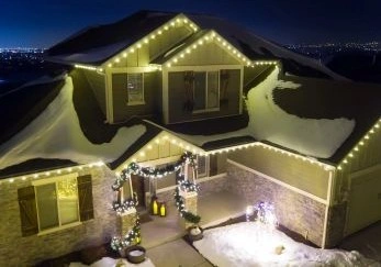 home decorated in holiday lights