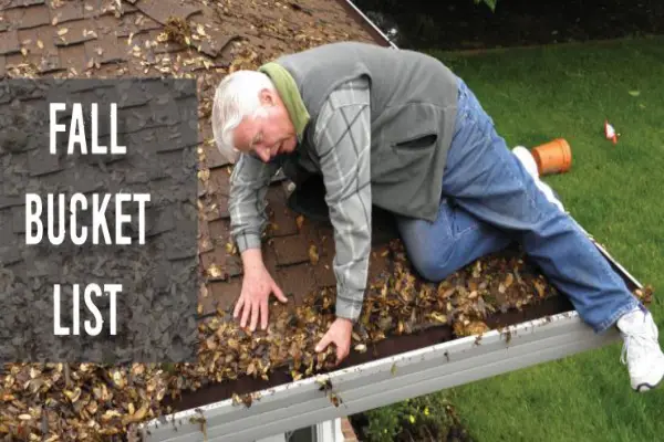 a man is cleaning gutter.