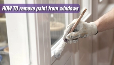 Painter painting window frames.